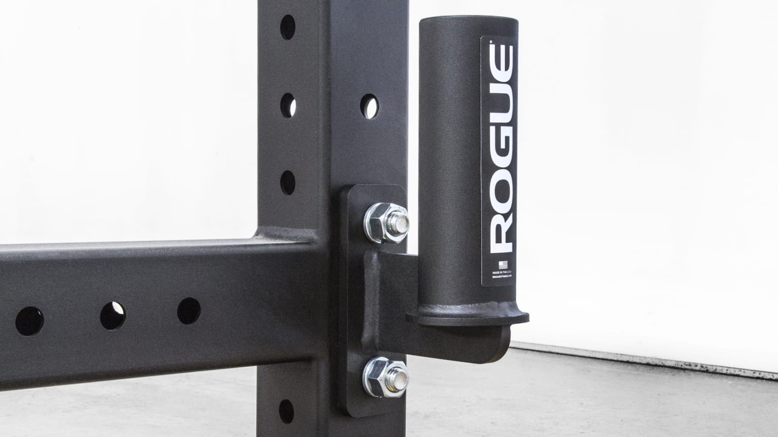 Bar holder for squat rack outlet